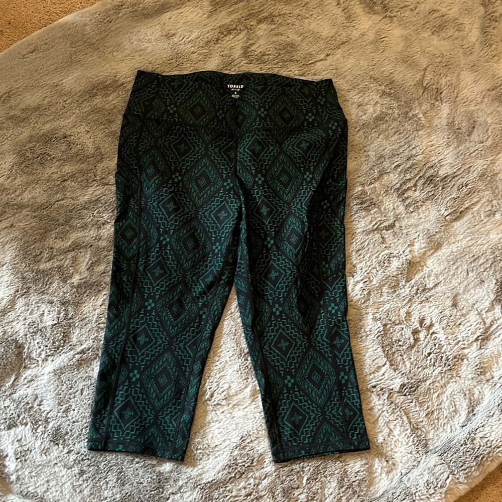 38. NWOT torrid size 2 beautiful green workout capris with pockets